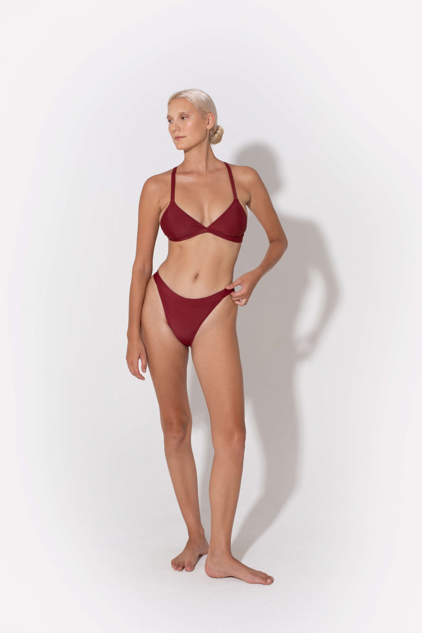 Hedy mid rise bikini bottoms in burgundy from luxury sustainable swimwear brand Koraru summer style bikini