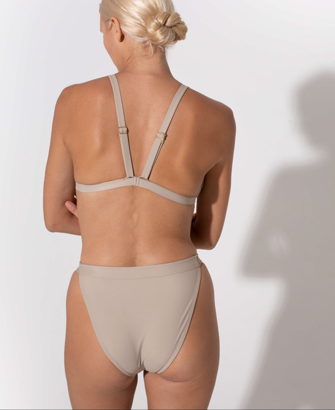 Hedy mid rise bikini bottoms in beige from luxury sustainable swimwear brand Koraru summer bikinis full coverage bikini