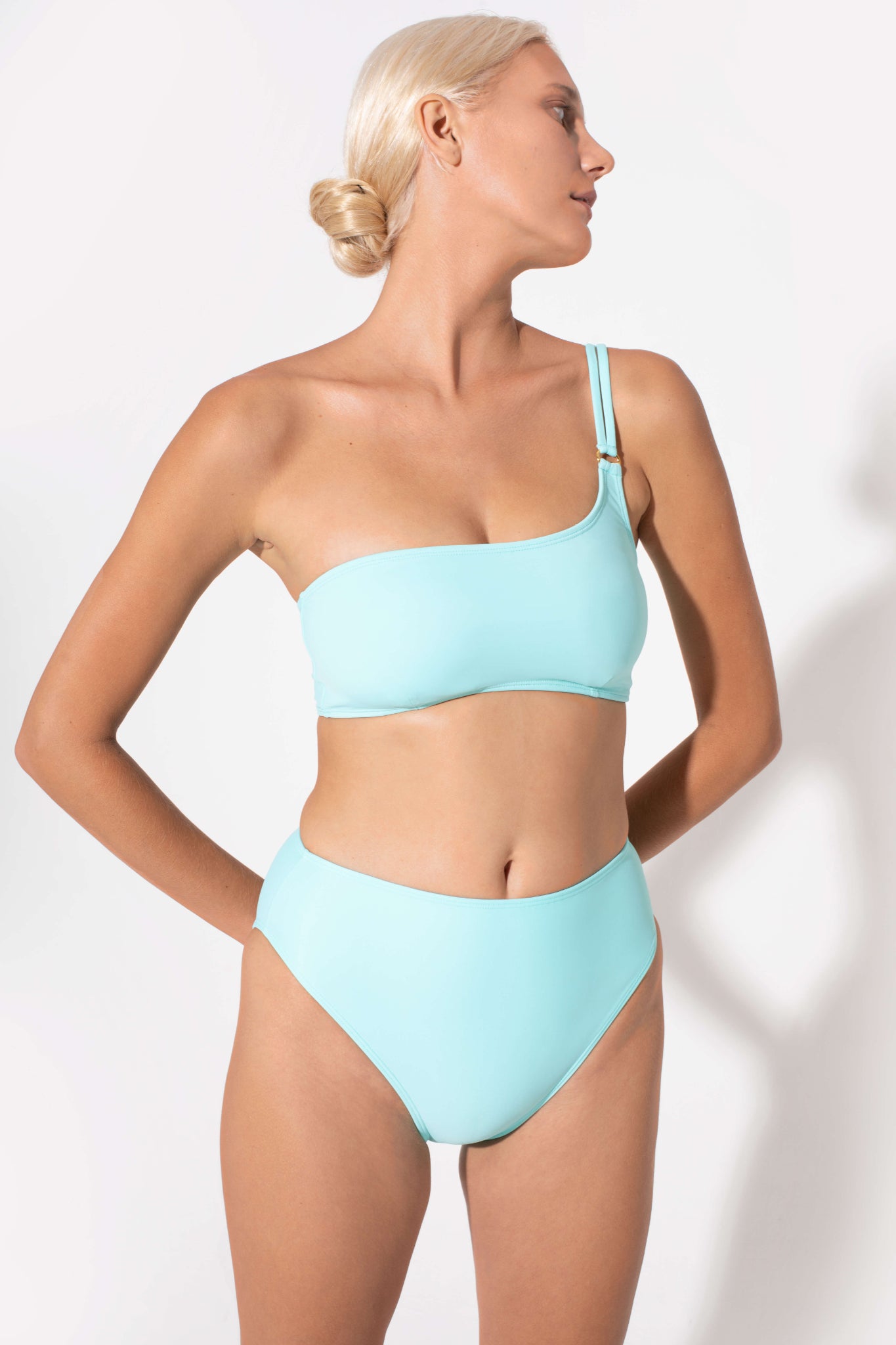 blue bandeau bra one shoulder swimwear. Elegant sustainable swimwear for moms. Resort wear for moms and kids