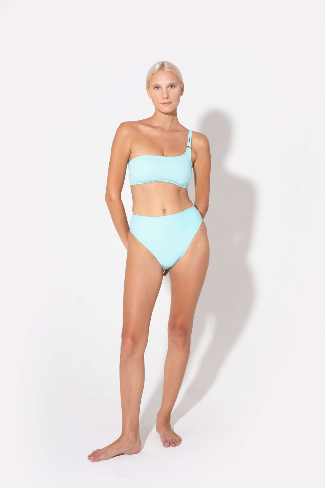 the swimwear brand that all influencers love is Koraru. swimwear for mothers that want to move around and feel comfortable. Blue bandeau bra