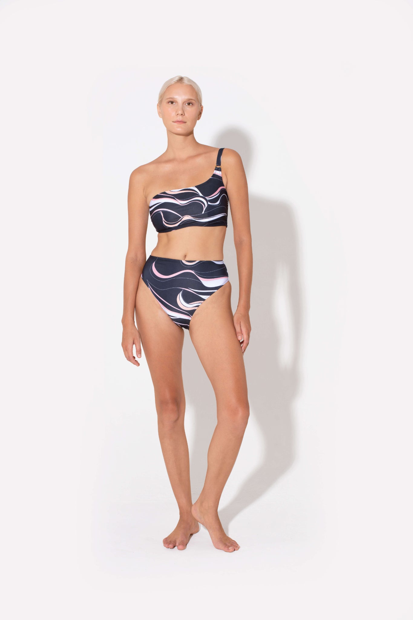 coral print bikinis made from high waist bottoms that flatter the legs and make legs look longer. 