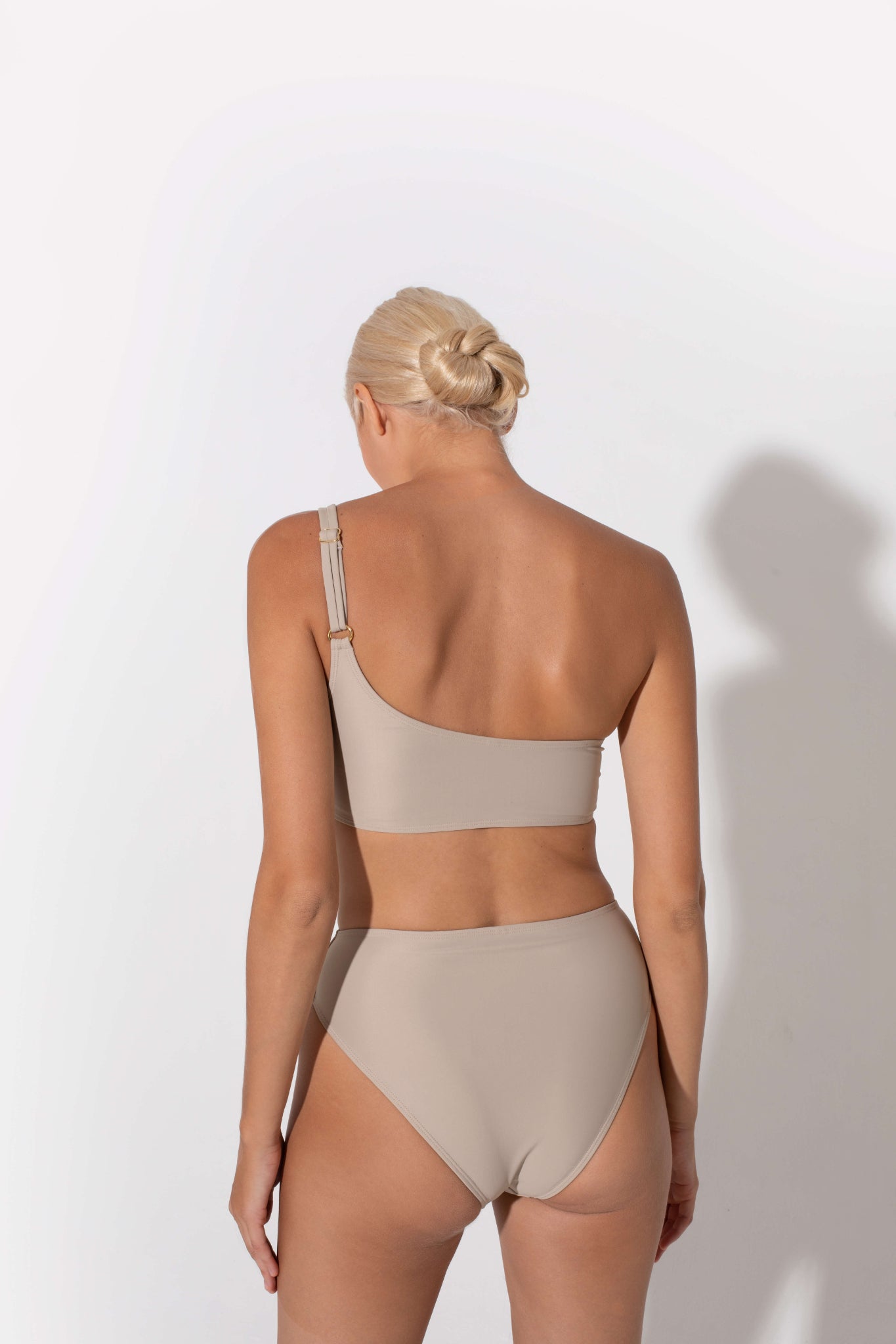 bikini that you can wear for the best tan ever this summer, low back beige top with one shoulder double strap