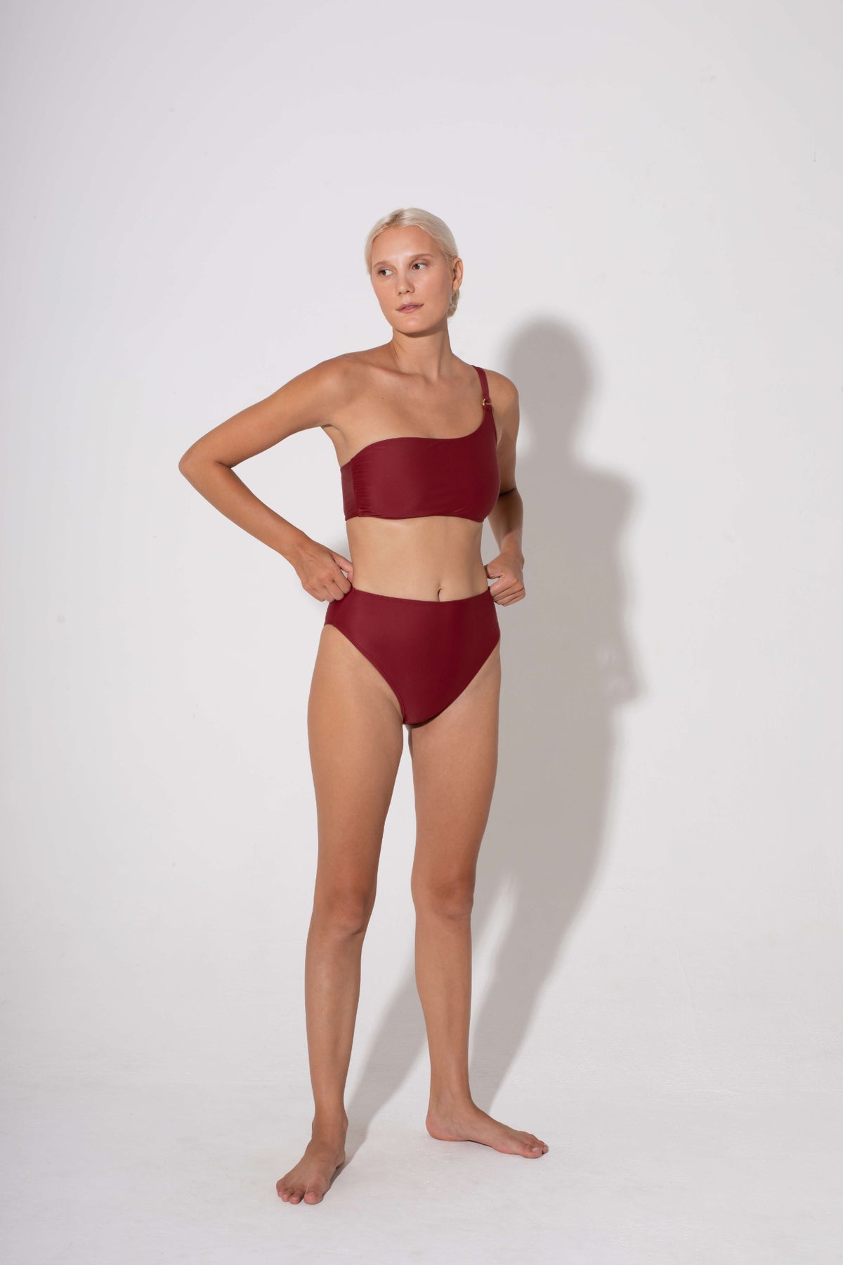 Annie High Waist Bikini Bottoms in burgundy by Kōraru