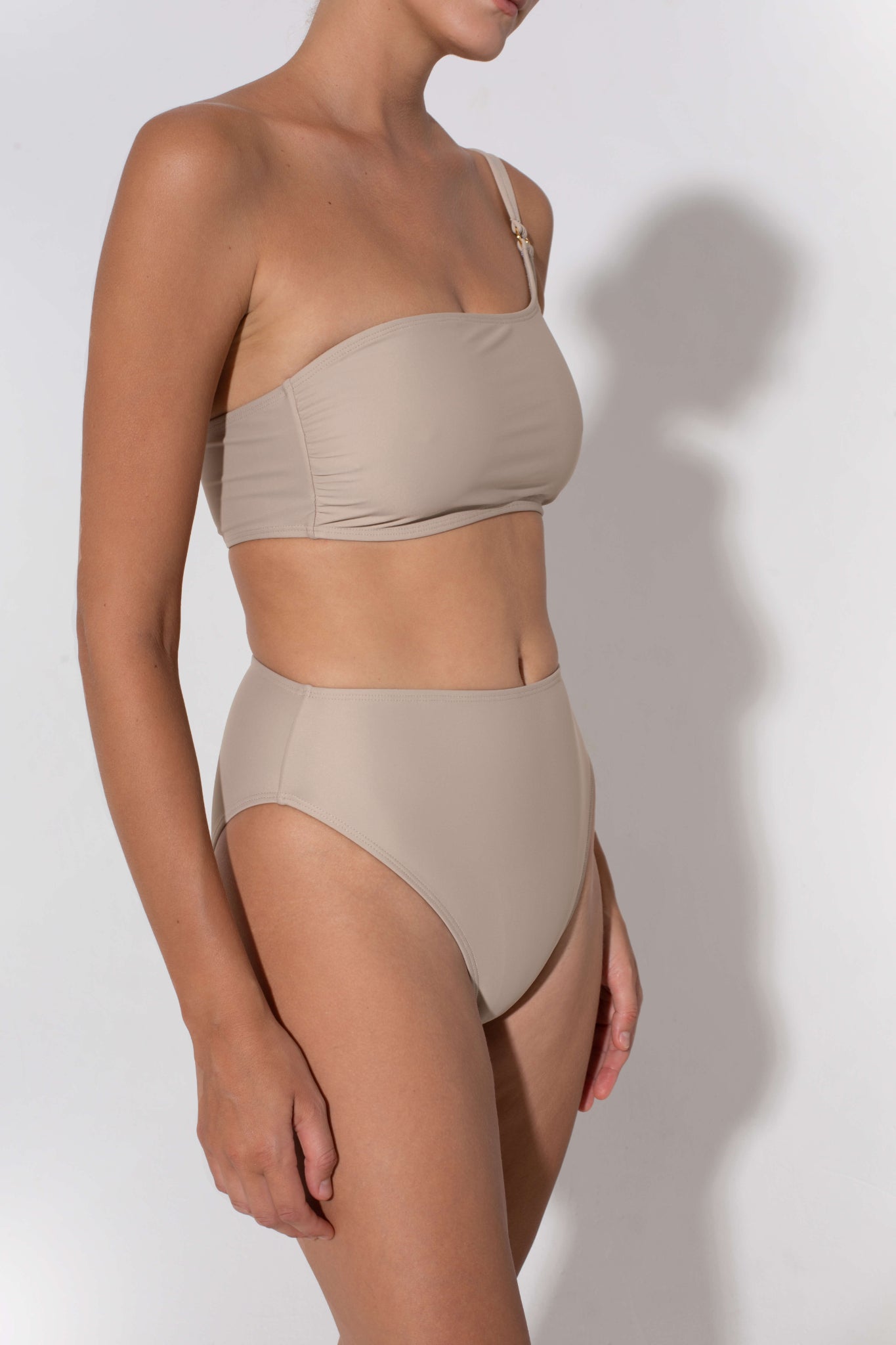 beige bandeau bra that flatters and makes it easy to get a tan