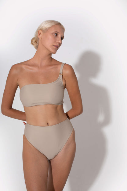 beige bandeau bra that is soft and comfortable and is perfect for tanning