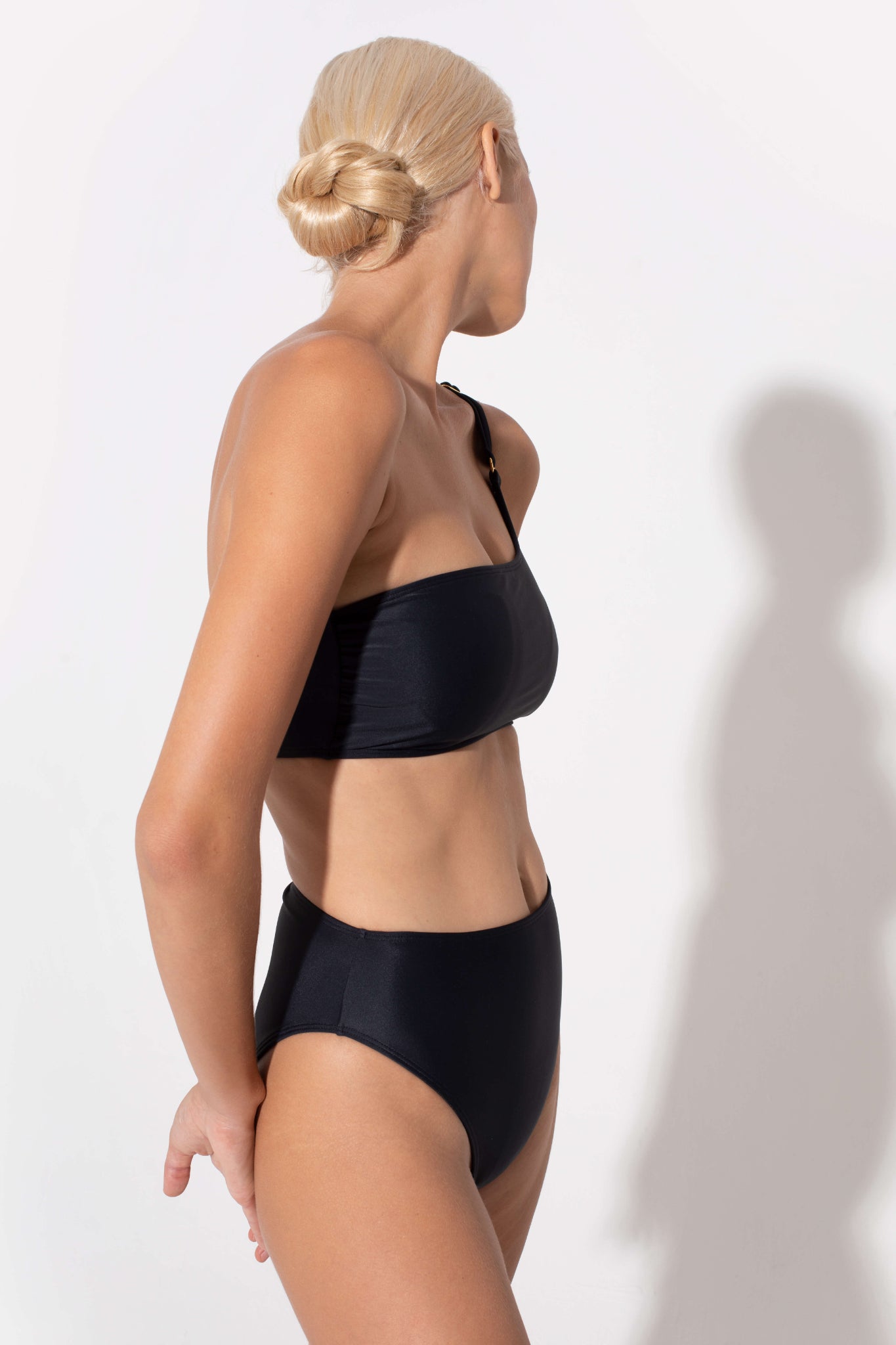 high support black bandeau bra by Koraru. Enjoy comfort while looking elegant and modern