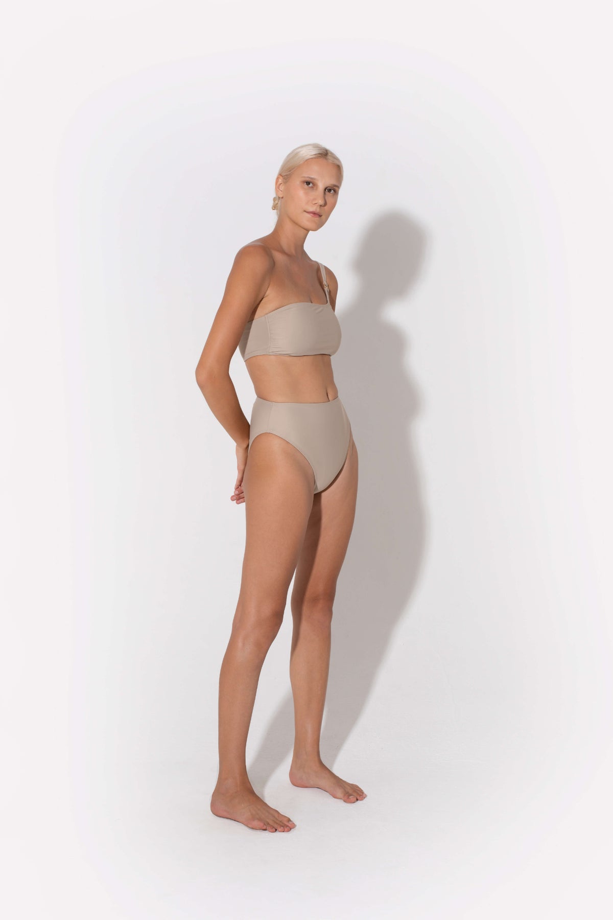 Annie High Waist Bikini Bottoms in beige by Kōraru