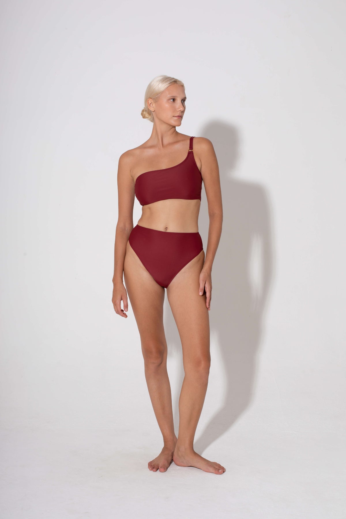 Annie One Shoulder Bandeau Bikini Top in burgundy by Kōraru