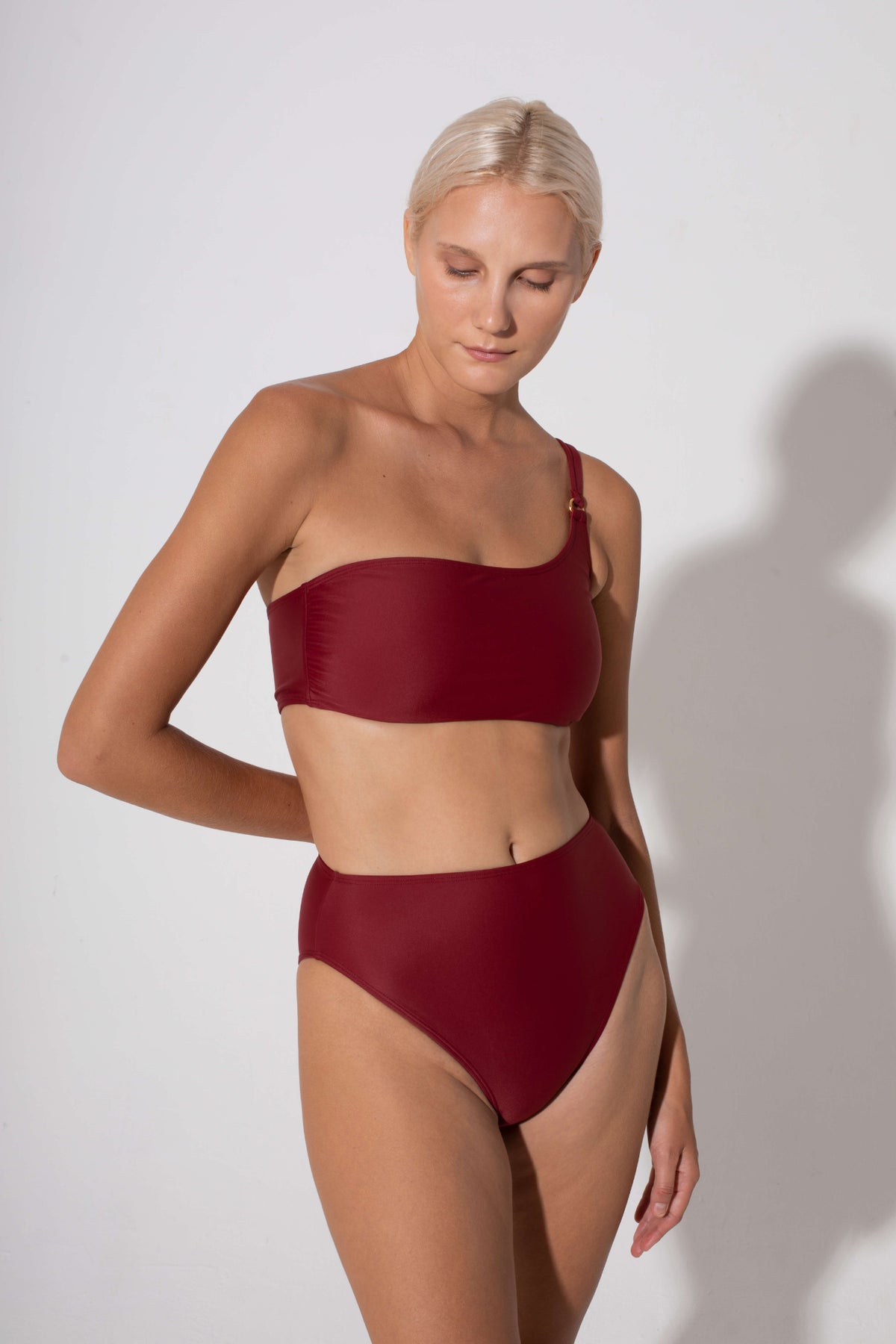 Annie One Shoulder Bandeau Bikini Top in burgundy by Kōraru