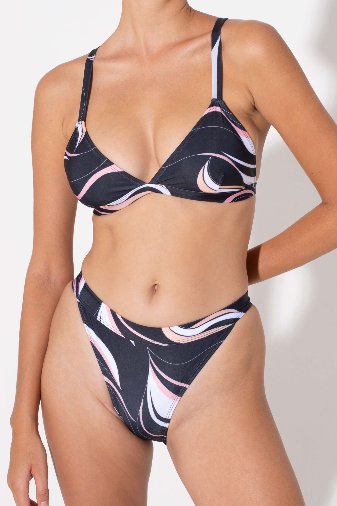 Hedy triangle bikini top in coral print from luxury sustainable swimwear brand Koraru sustainable bikinis