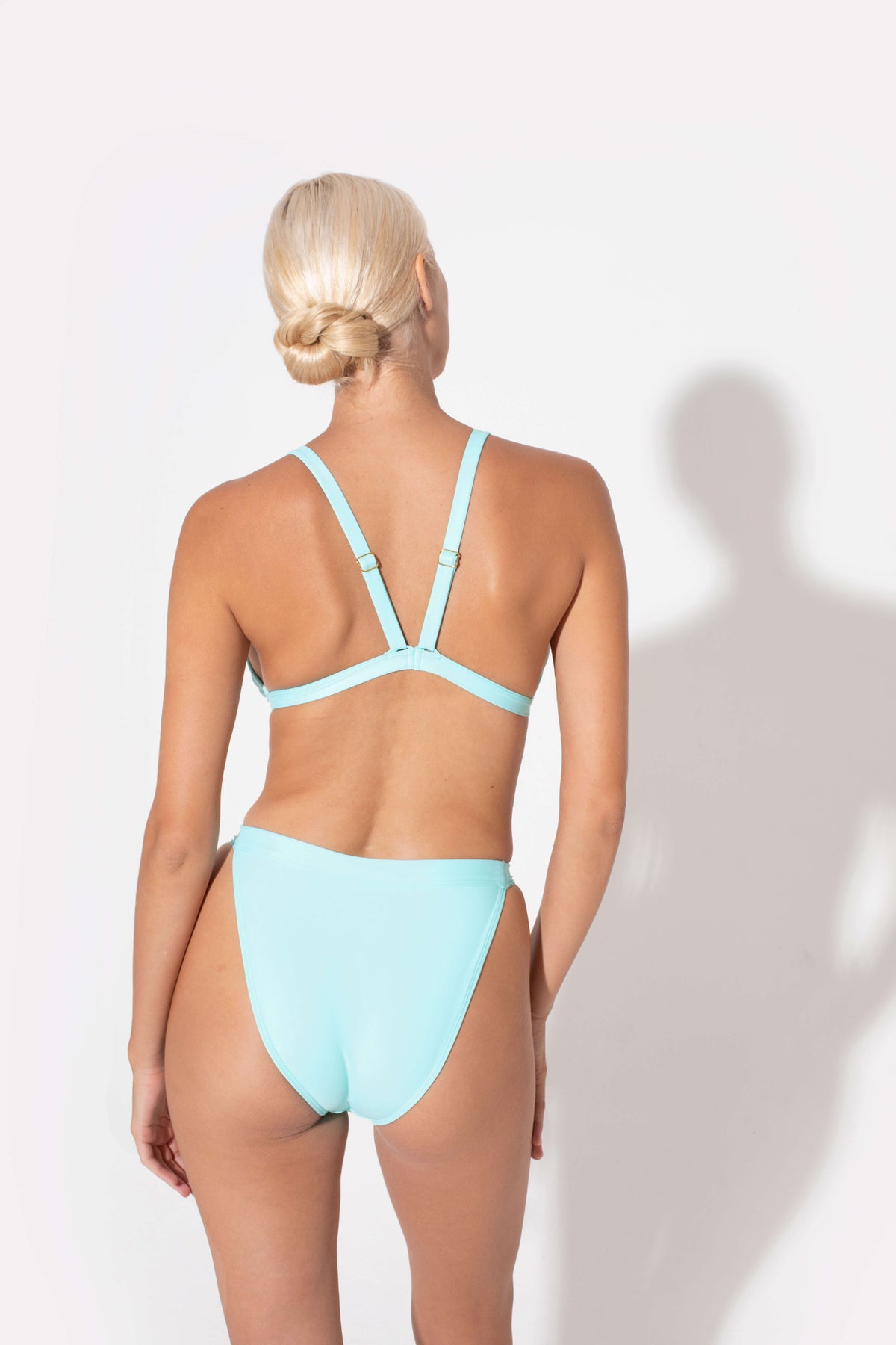 Hedy Mid Rise Bikini Bottoms in aqua by Kōraru