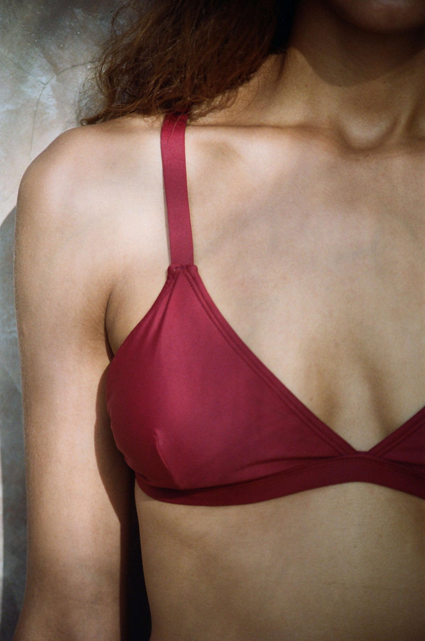 Hedy triangle bikini top in burgundy from luxury sustainable swimwear brand Koraru