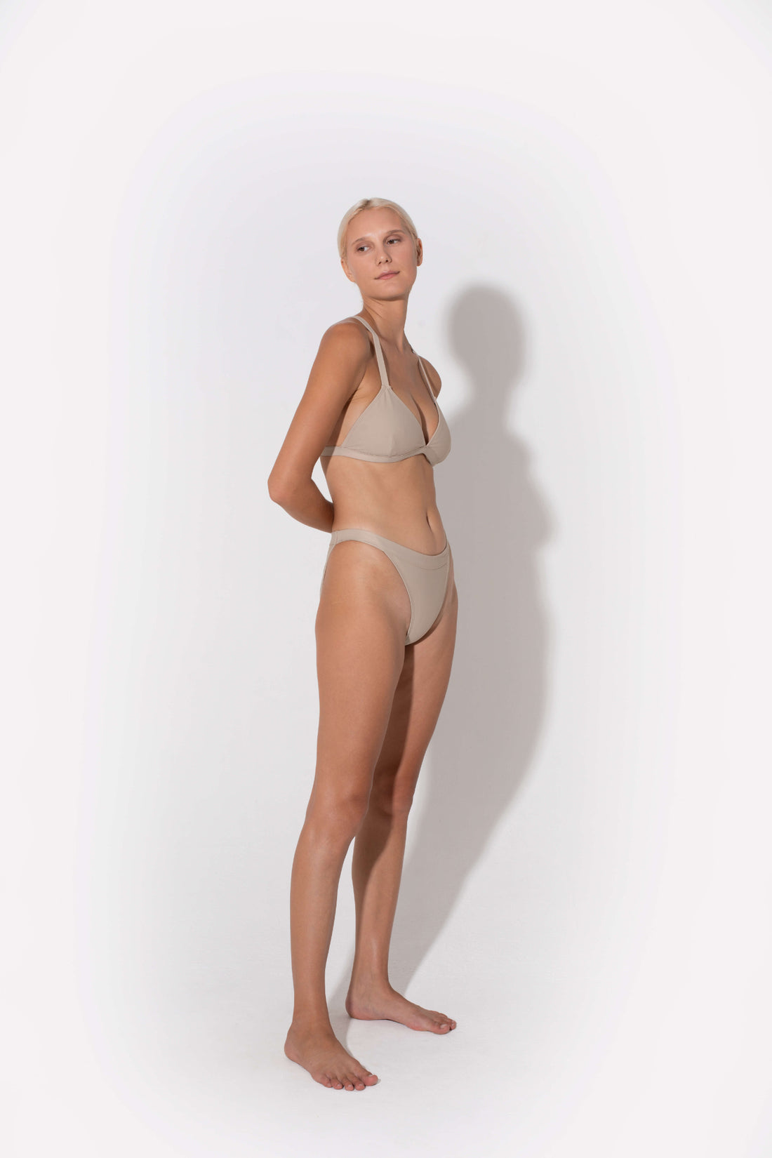 Hedy triangle bikini top in beige from luxury sustainable swimwear brand Koraru bikinis to tan in
