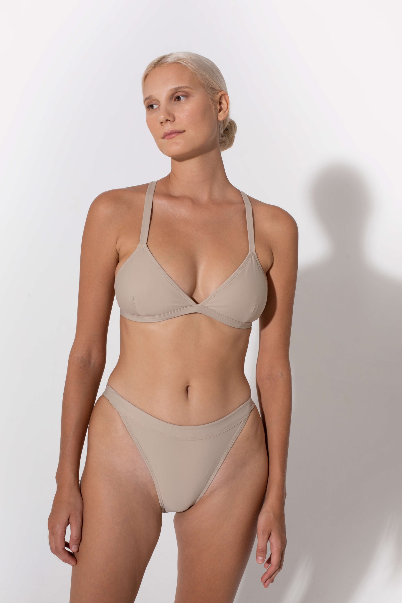 Hedy triangle bikini top in beige from luxury sustainable swimwear brand Koraru sustainable fashion