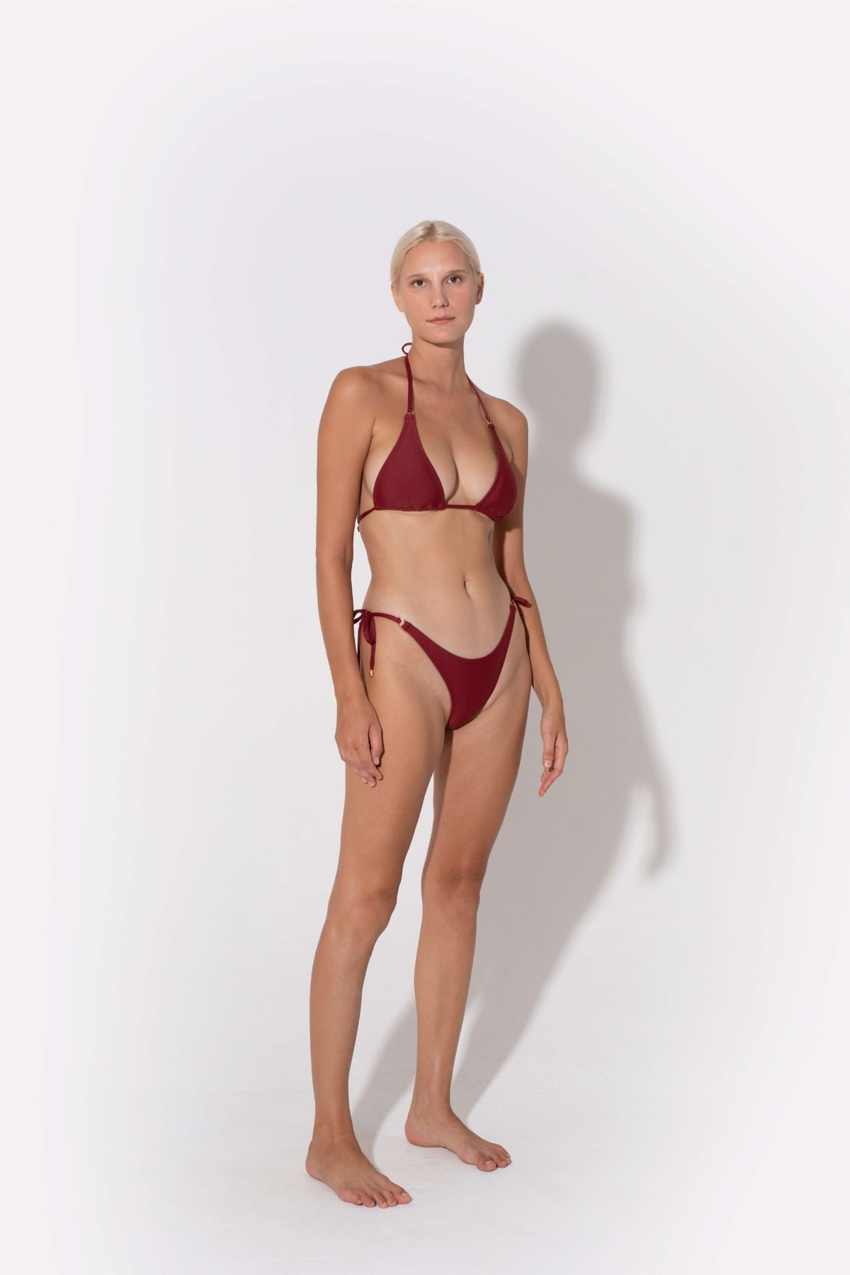 Marie Side Tie Bikini Bottoms in burgundy by Kōraru